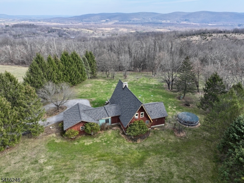 156 Lott Road Wantage, NJ 07461 - Photo 36 of 44 a aerial view of a house with yard and outdoor seating