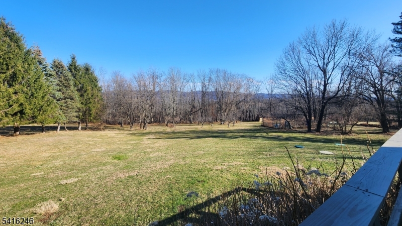 156 Lott Road Wantage, NJ 07461 - Photo 5 of 44 a view of a swimming pool with a yard