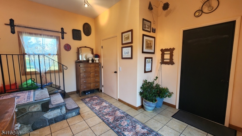 156 Lott Road Wantage, NJ 07461 - Photo 8 of 44 a view of an entryway door front of house