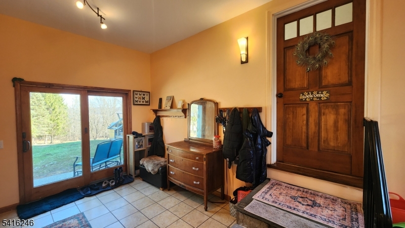 156 Lott Road Wantage, NJ 07461 - Photo 9 of 44 a view of a hallway with workspace