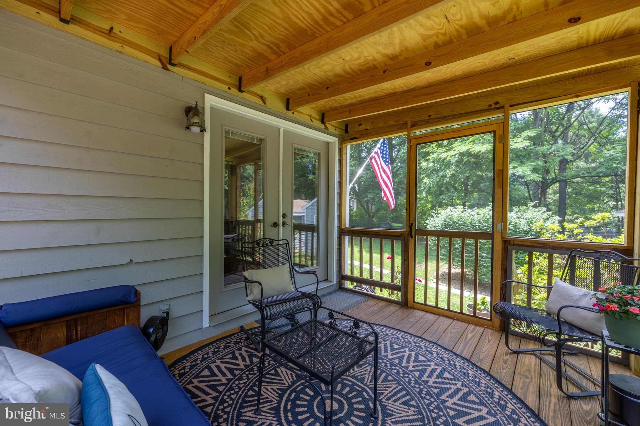164 Oliver Lane Ruckersville, VA 22968 - Photo 7 of 39 Serene screened porch with garden views.