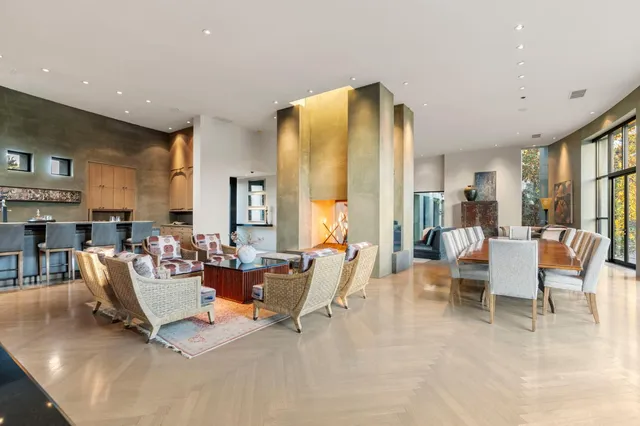 a bathroom with a double vanity sink toilet and a mirror