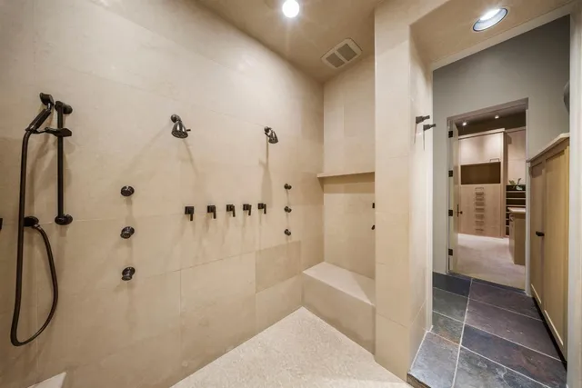 a view of swimming pool with outdoor seating and plants