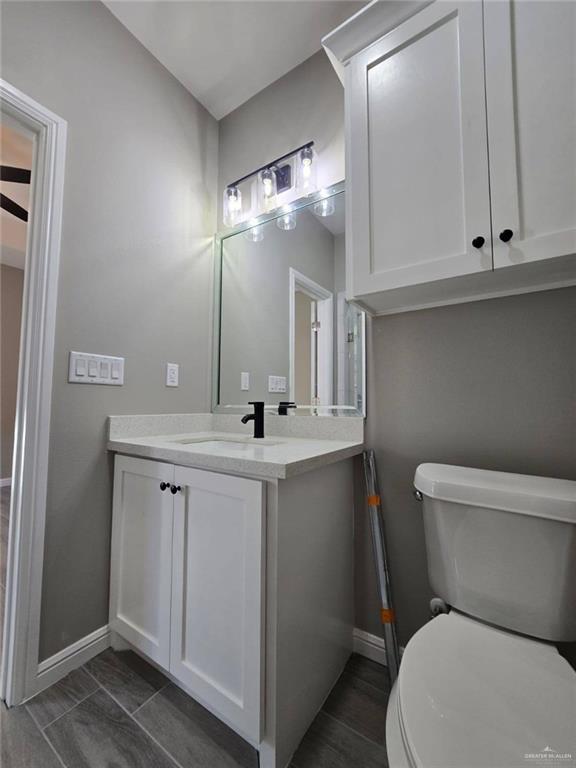 1204 Cornerstone Loop Rio Grande City, TX 78582 - Photo 7 of 15 a bathroom with a toilet sink and mirror