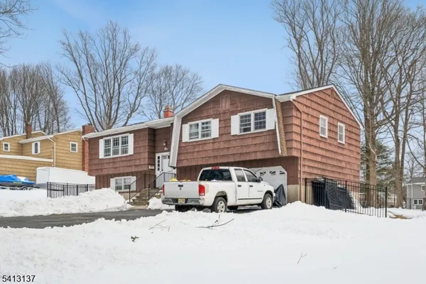 a car parked in front of a house