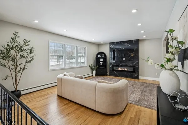 a living room with furniture and a table