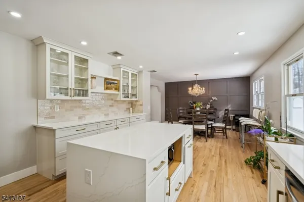 a view of a living room and dining room