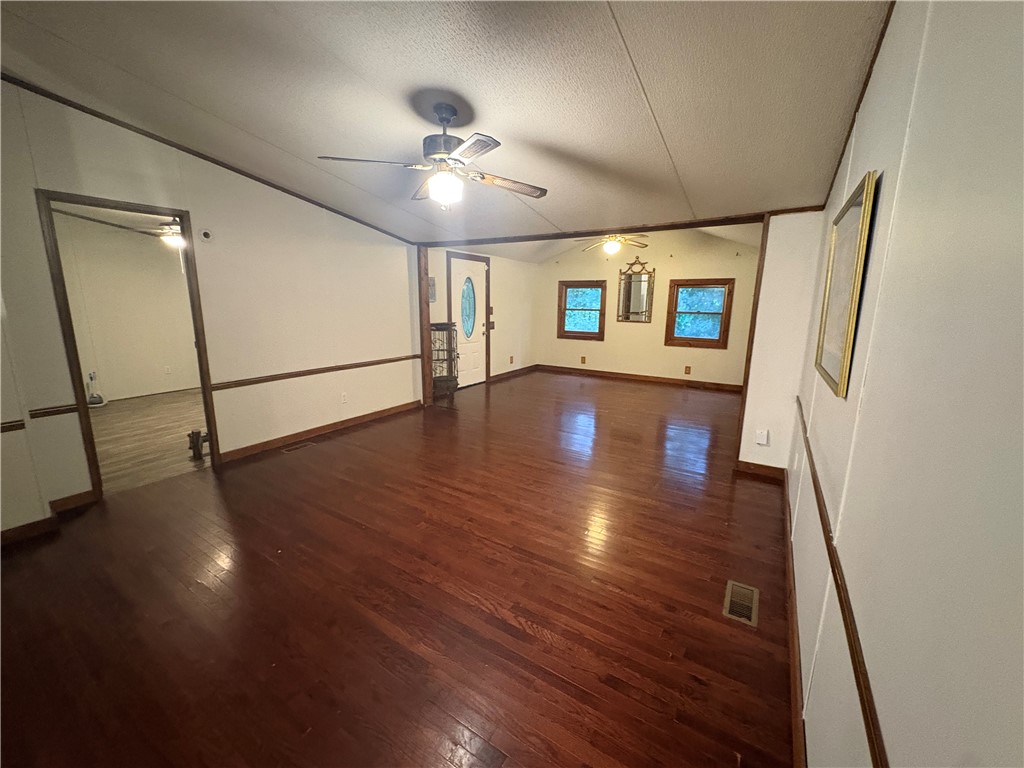 155 Hickory Ridge Mountain Rest, SC 29664 - Photo 12 of 21 Gleaming hardwood floors and vaulted ceilings define this inviting living space.