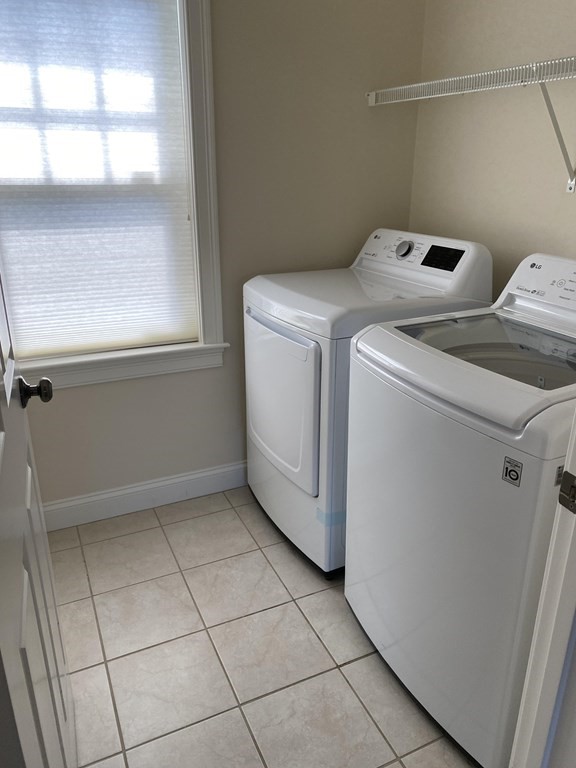 6 Essex Road, Unit 16 Ipswich, MA 01938 - Photo 13 of 14 a utility room with dryer and washer