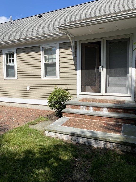 6 Essex Road, Unit 16 Ipswich, MA 01938 - Photo 4 of 14 a view of backyard of a house
