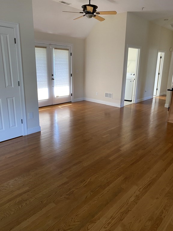 6 Essex Road, Unit 16 Ipswich, MA 01938 - Photo 6 of 14 a view of a livingroom with wooden floor