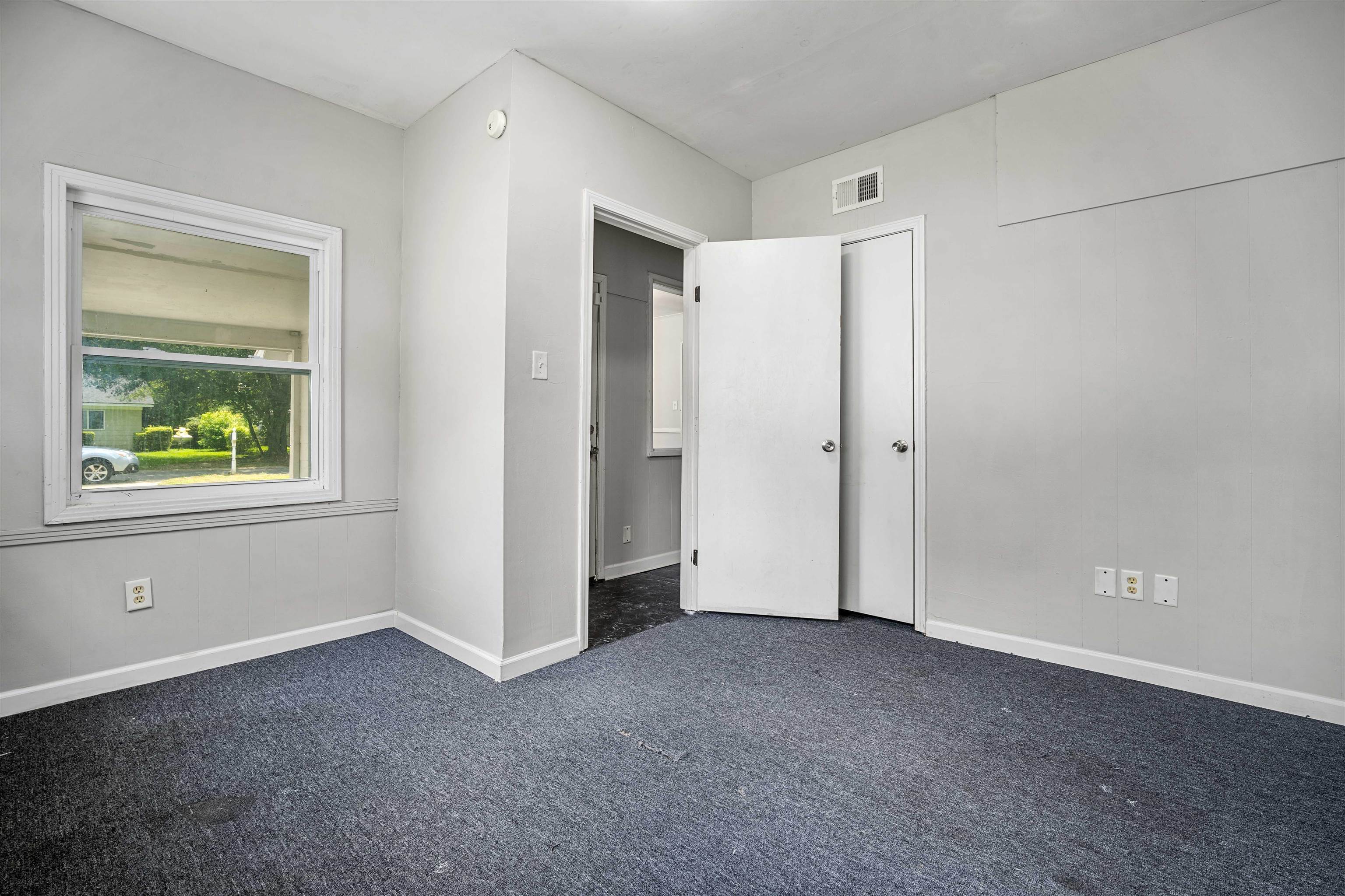 3014 Farcott Street Mobile, AL 36606 - Photo 23 of 26 Unfurnished bedroom with dark carpet and baseboards