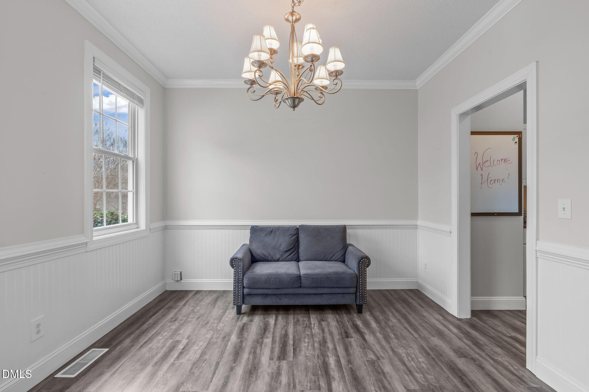 2501 Springfield Park Drive Raleigh, NC 27614 - Photo 5 of 44 a living room with furniture and a wooden floor