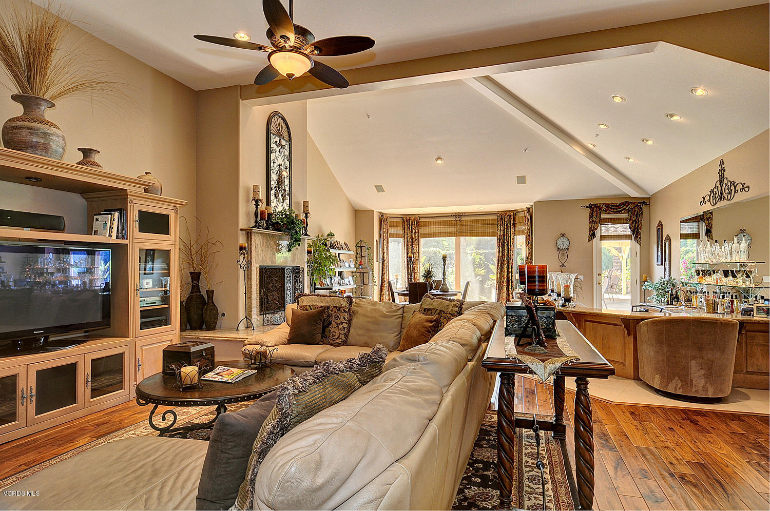 11186 Red Barn Road Camarillo, CA 93012 - Photo 14 of 41 a living room with fireplace furniture and a flat screen tv