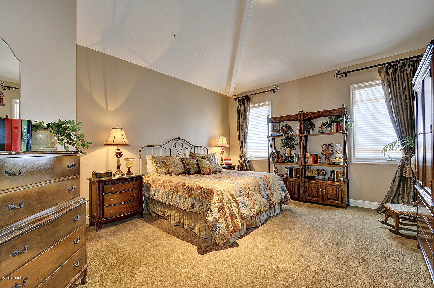 11186 Red Barn Road Camarillo, CA 93012 - Photo 22 of 41 a bedroom with a bed and gym equipment