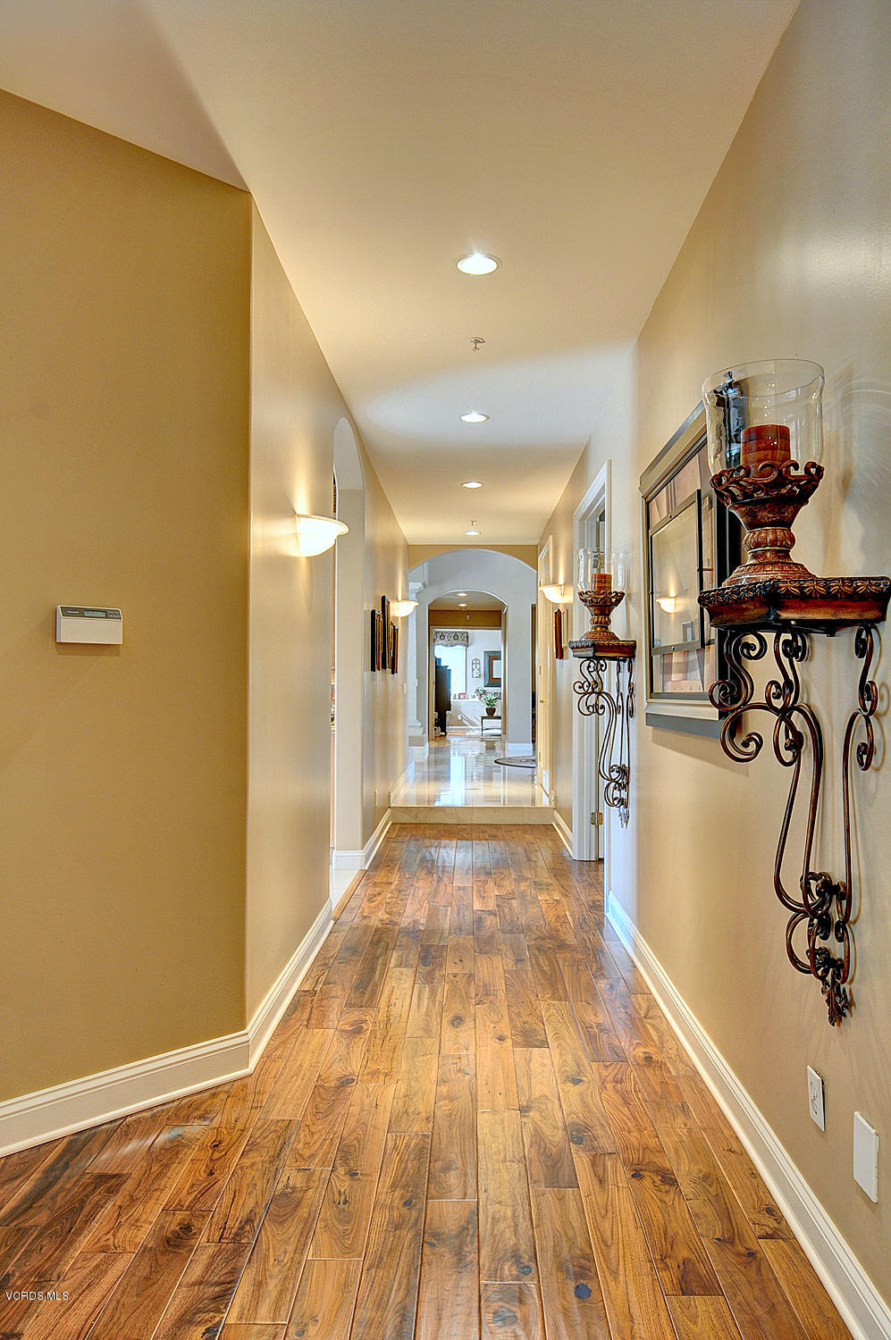11186 Red Barn Road Camarillo, CA 93012 - Photo 28 of 41 a view of a hallway with wooden floor