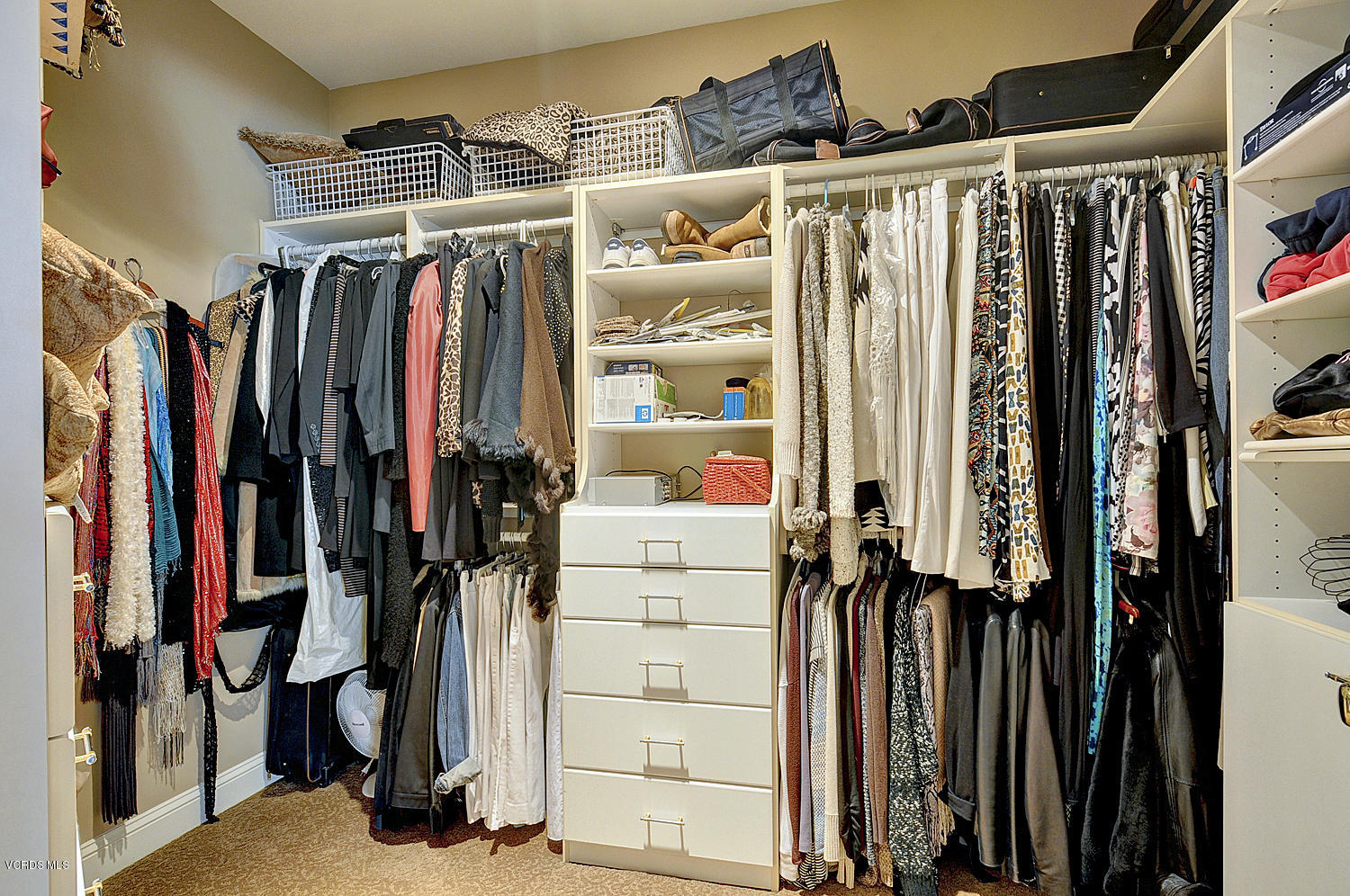 11186 Red Barn Road Camarillo, CA 93012 - Photo 31 of 41 a view of walk in closet with clothes and shoes
