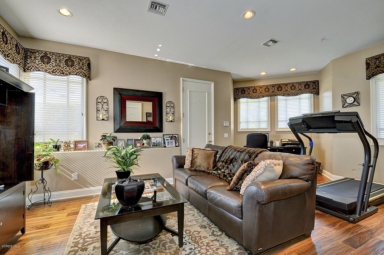 11186 Red Barn Road Camarillo, CA 93012 - Photo 32 of 41 a living room with furniture and a flat screen tv