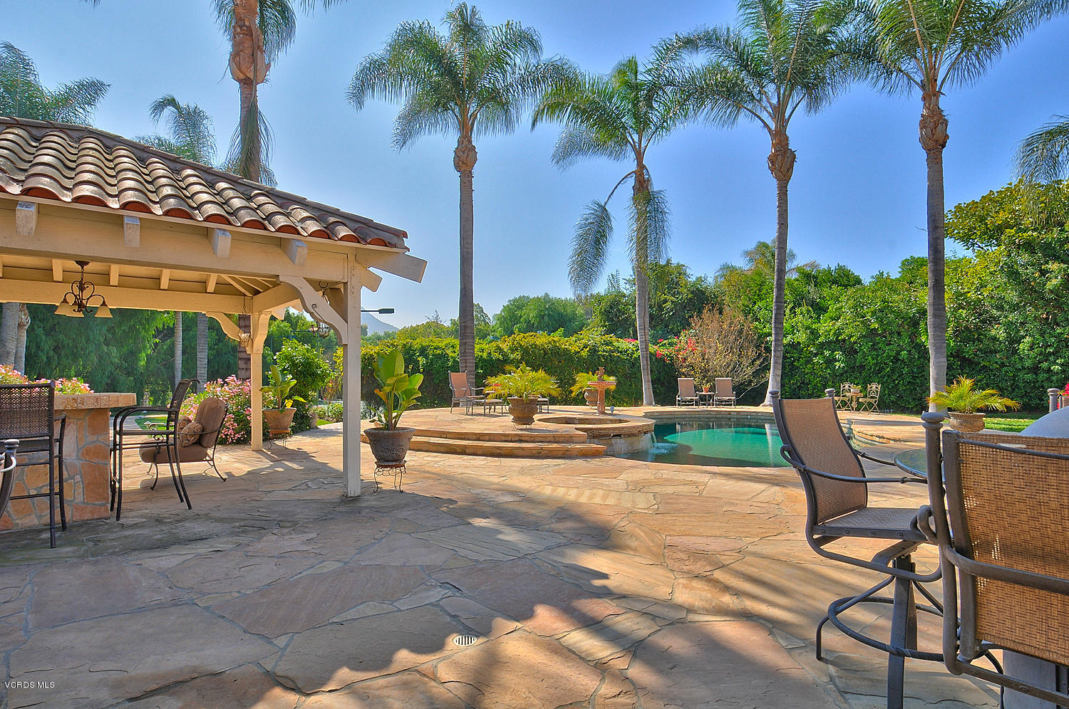 11186 Red Barn Road Camarillo, CA 93012 - Photo 33 of 41 a view of a table and chairs in patio