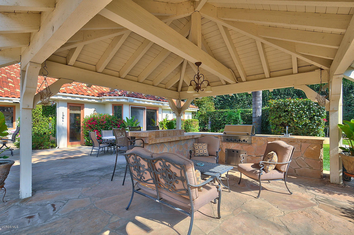 11186 Red Barn Road Camarillo, CA 93012 - Photo 35 of 41 a view of patio with table and chairs under an umbrella