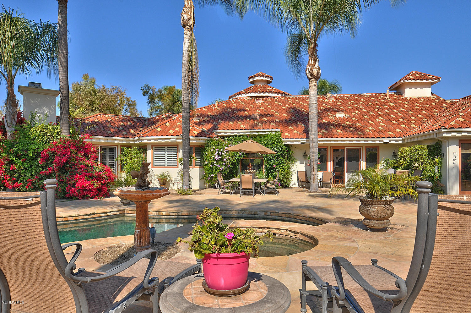 11186 Red Barn Road Camarillo, CA 93012 - Photo 40 of 41 a front view of house with outdoor seating and potted plants