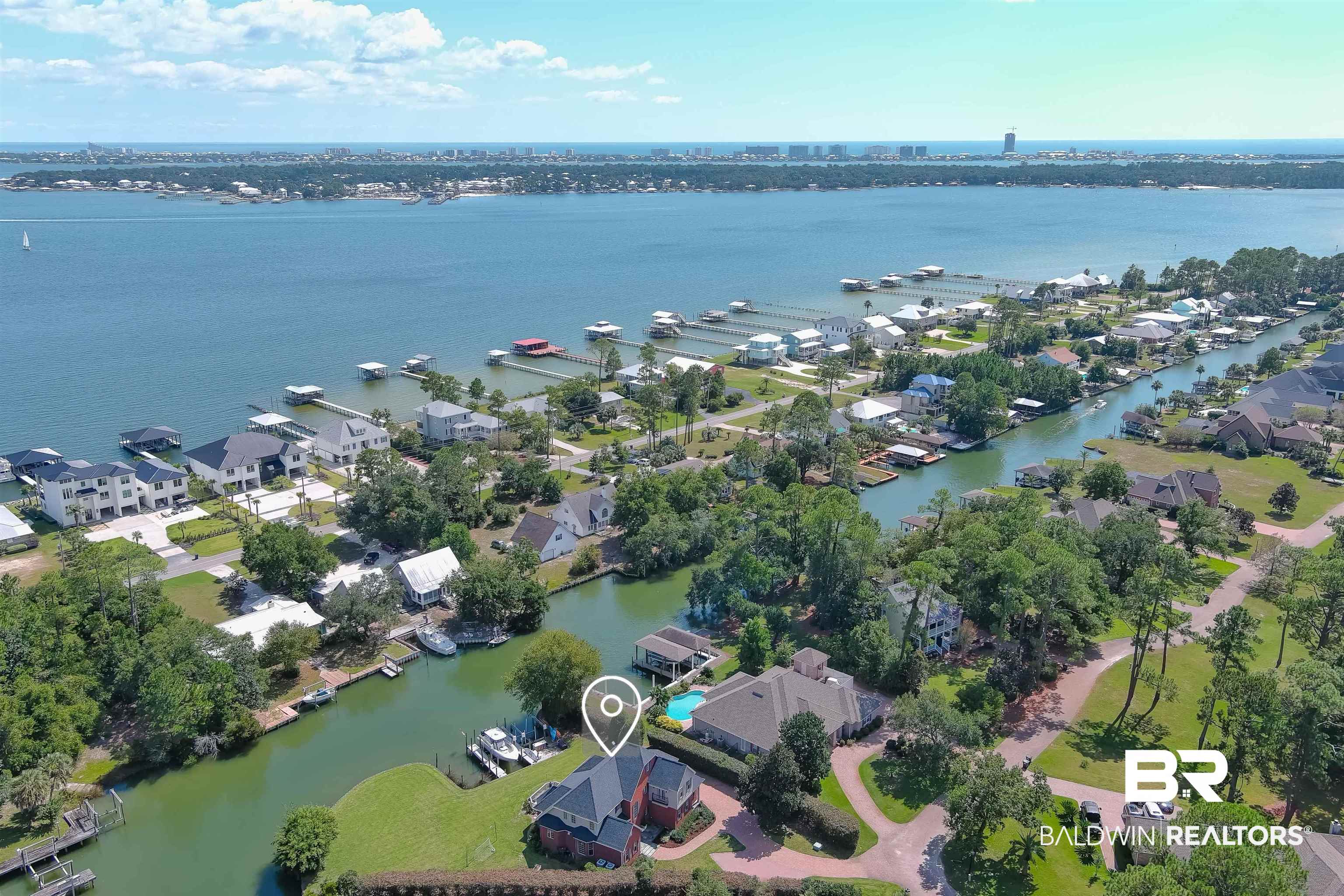 6630 East Quarry Drive Elberta, AL 36530 - Photo 56 of 63 Aerial view of property and surrounding area featuring nearby suburban area and a large body of water