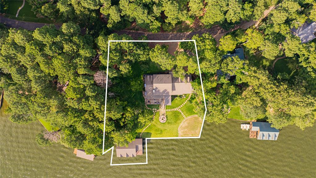 582 Windy Point Mount Vernon, TX 75457 - Photo 12 of 38 Aerial view of property and surrounding area with property parcel outlined