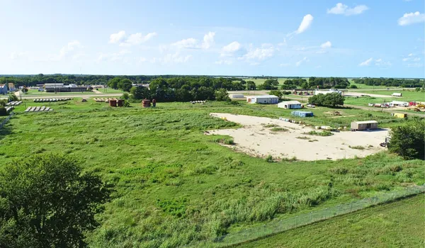 a view of a garden with an outdoor space