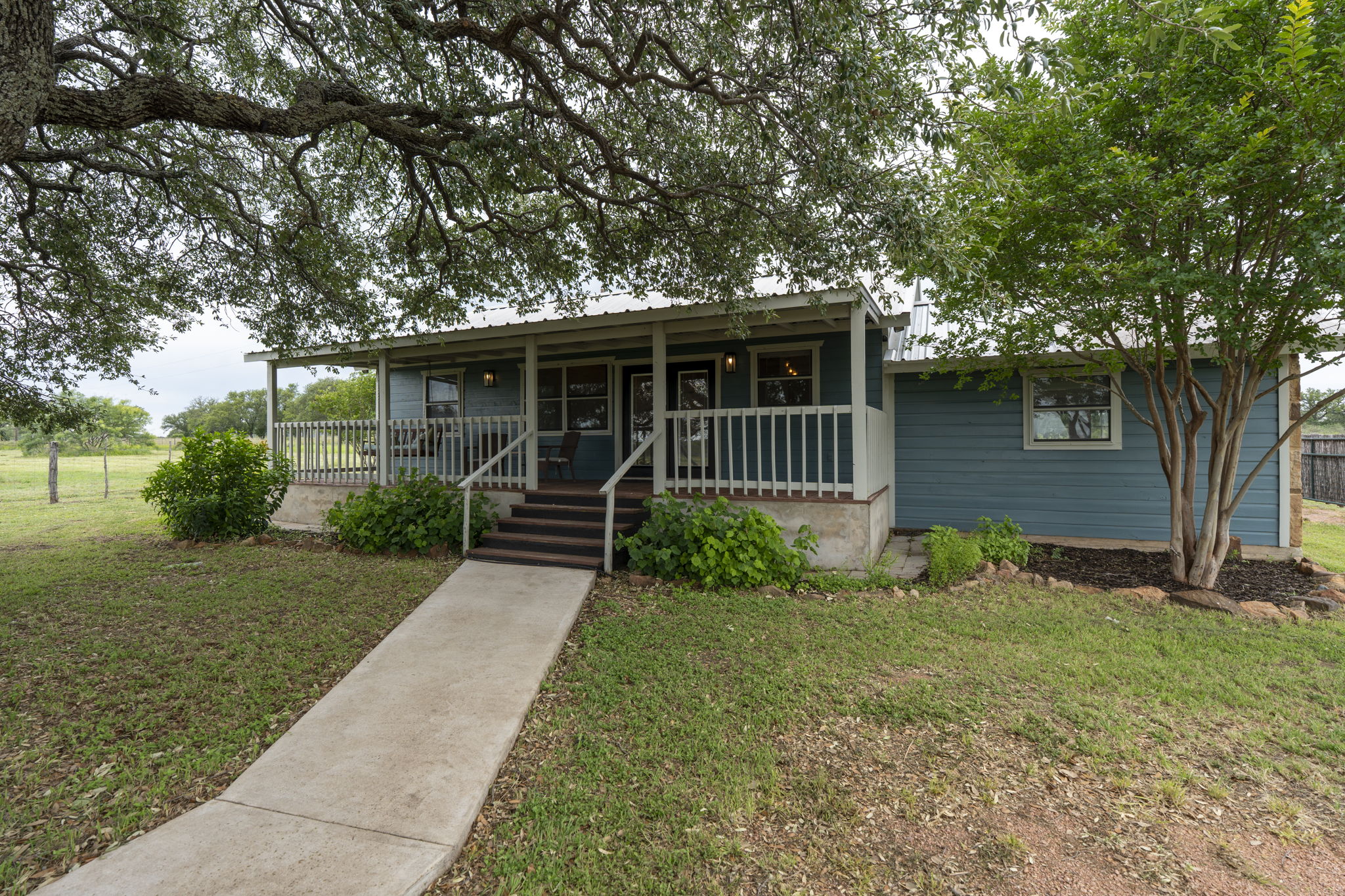225 Ischar Lane Mason, TX 76856 - Photo 1 of 37 a front view of house with yard and green space
