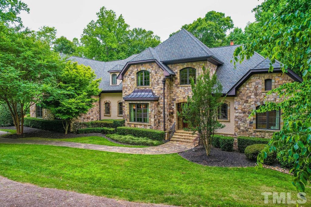 11213 Jonas Ridge Lane Raleigh, NC 27613 - Photo 3 of 100 a front view of a house with a garden
