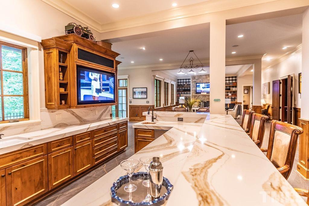 11213 Jonas Ridge Lane Raleigh, NC 27613 - Photo 68 of 100 a large kitchen with lots of counter space