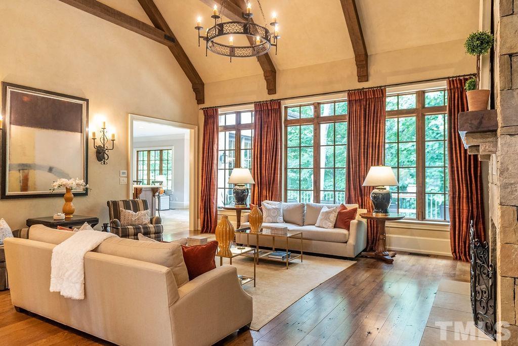 11213 Jonas Ridge Lane Raleigh, NC 27613 - Photo 8 of 100 a living room with furniture and a large window