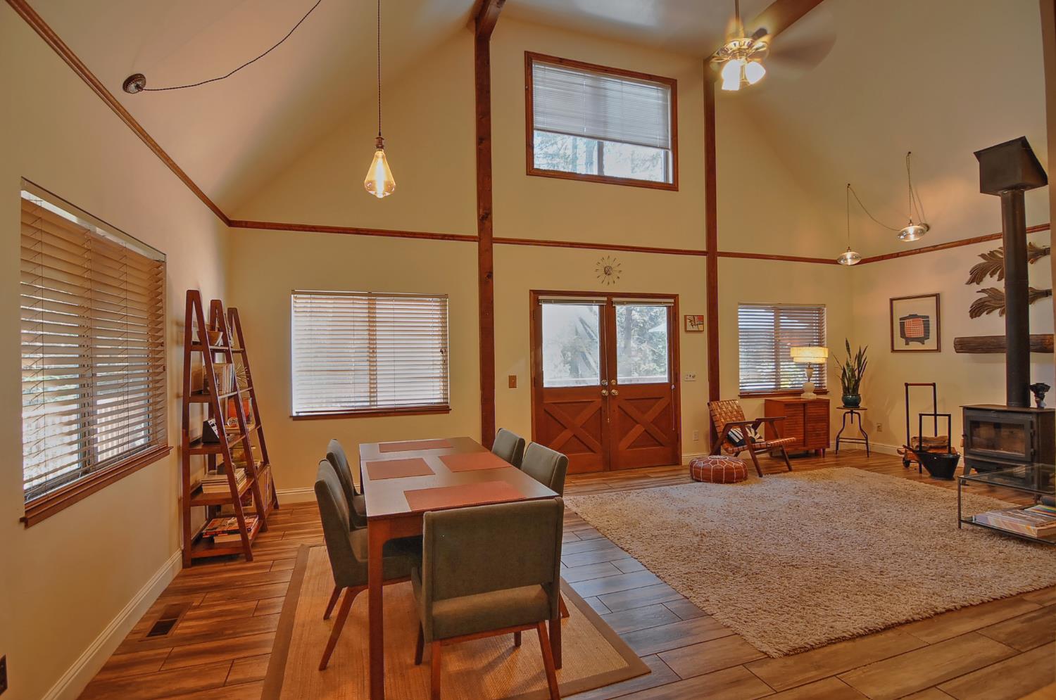 16914 Pasquale Road Nevada City, CA 95959 - Photo 13 of 32 a view of a dining room with furniture window and wooden floor