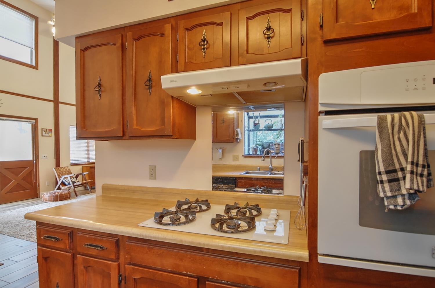 16914 Pasquale Road Nevada City, CA 95959 - Photo 20 of 32 a kitchen with stainless steel appliances granite countertop a refrigerator and a stove