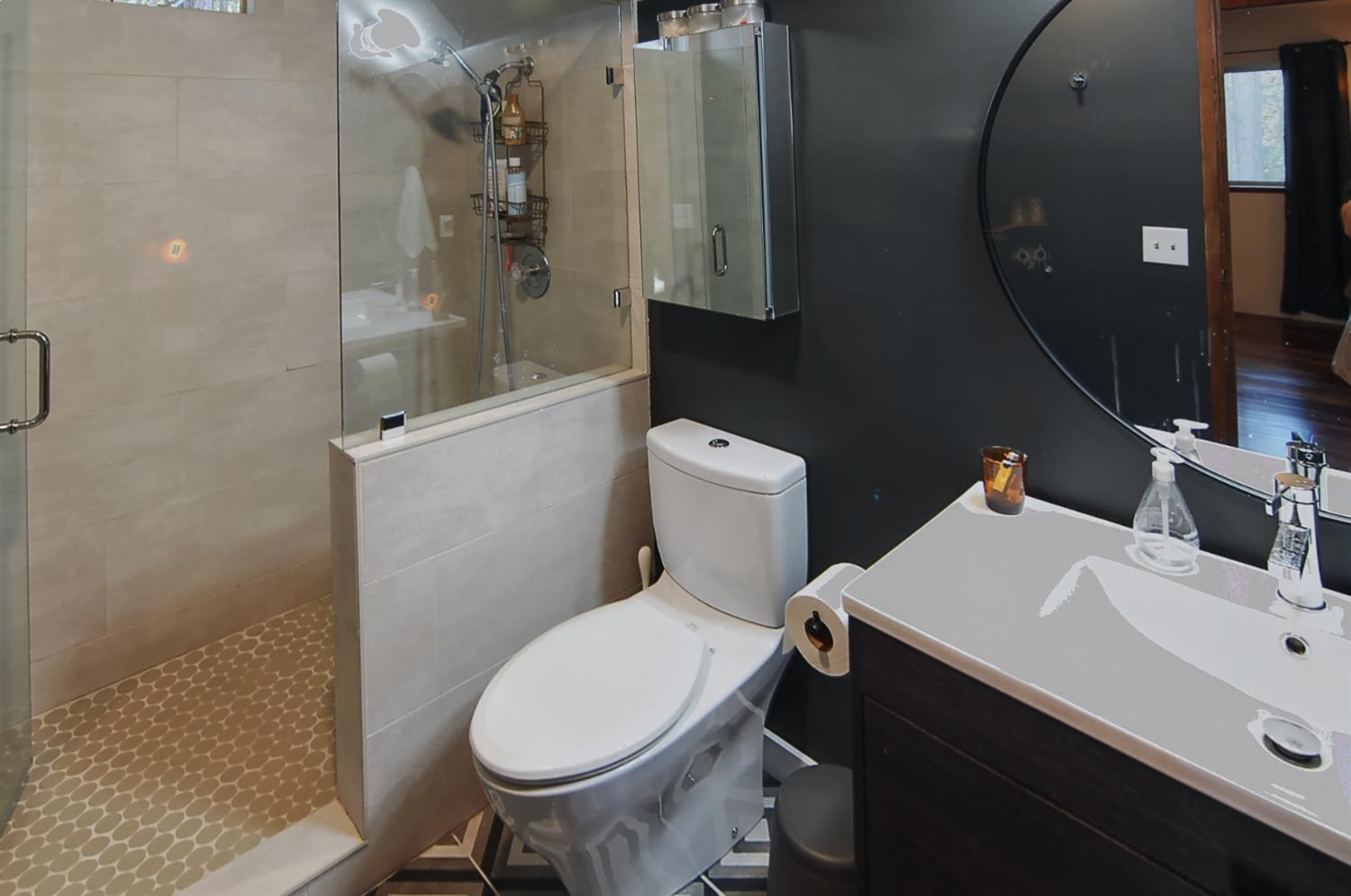 16914 Pasquale Road Nevada City, CA 95959 - Photo 23 of 32 a bathroom with a sink toilet and shower