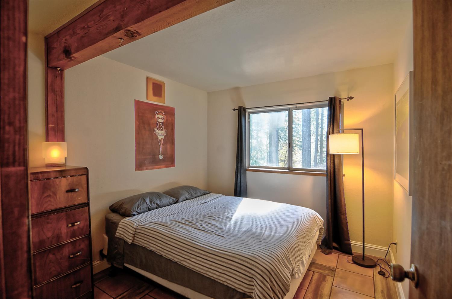 16914 Pasquale Road Nevada City, CA 95959 - Photo 24 of 32 a bedroom with a bed and a window