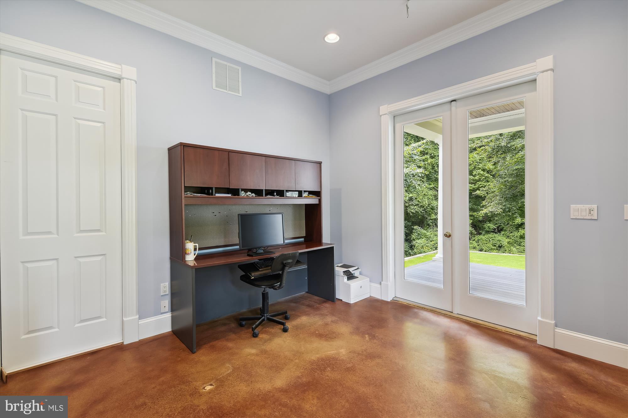 357 Forest Beach Road Annapolis, MD 21409 - Photo 17 of 91 a view of a workspace with furniture and a window