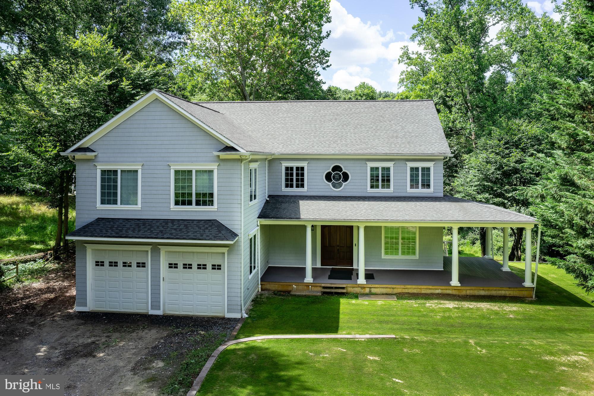 357 Forest Beach Road Annapolis, MD 21409 - Photo 3 of 91 a view of a house with a yard and a garden