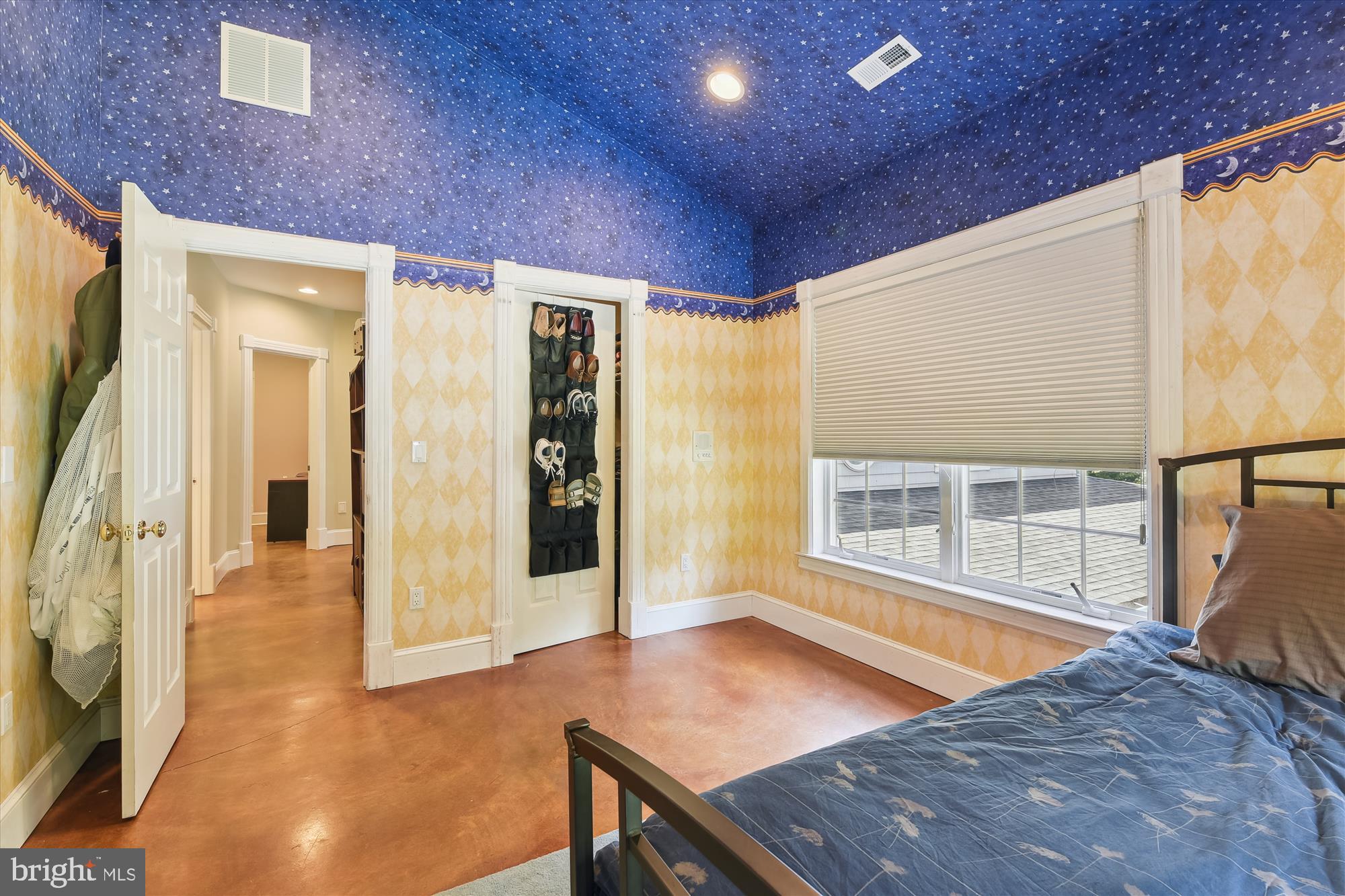 357 Forest Beach Road Annapolis, MD 21409 - Photo 31 of 91 an empty room with wooden floor and windows