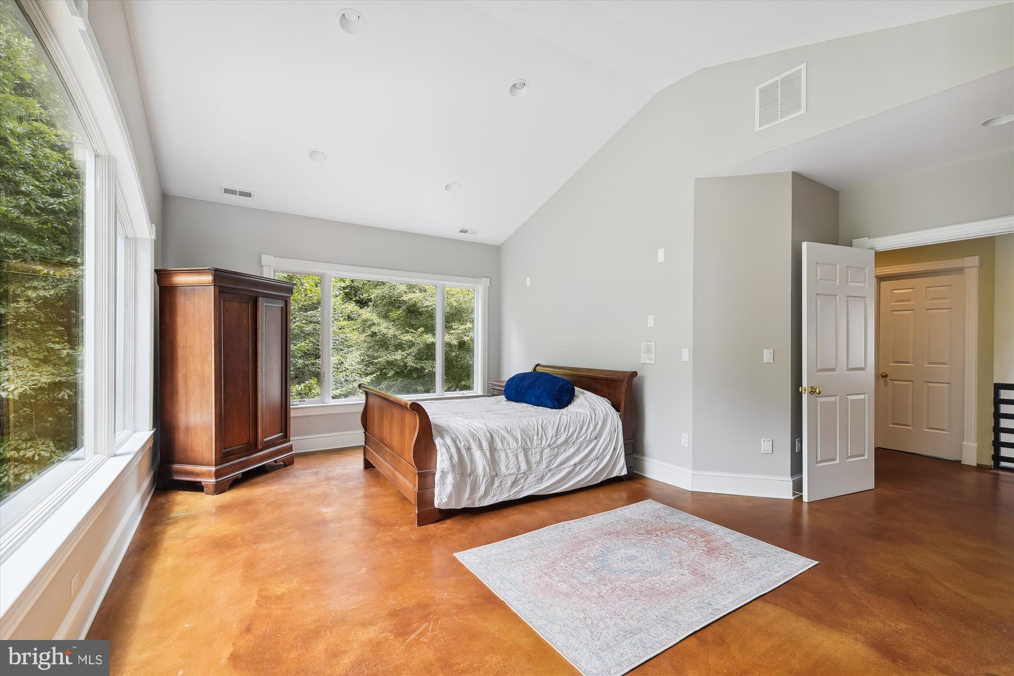 357 Forest Beach Road Annapolis, MD 21409 - Photo 36 of 91 a bedroom with furniture and a large window