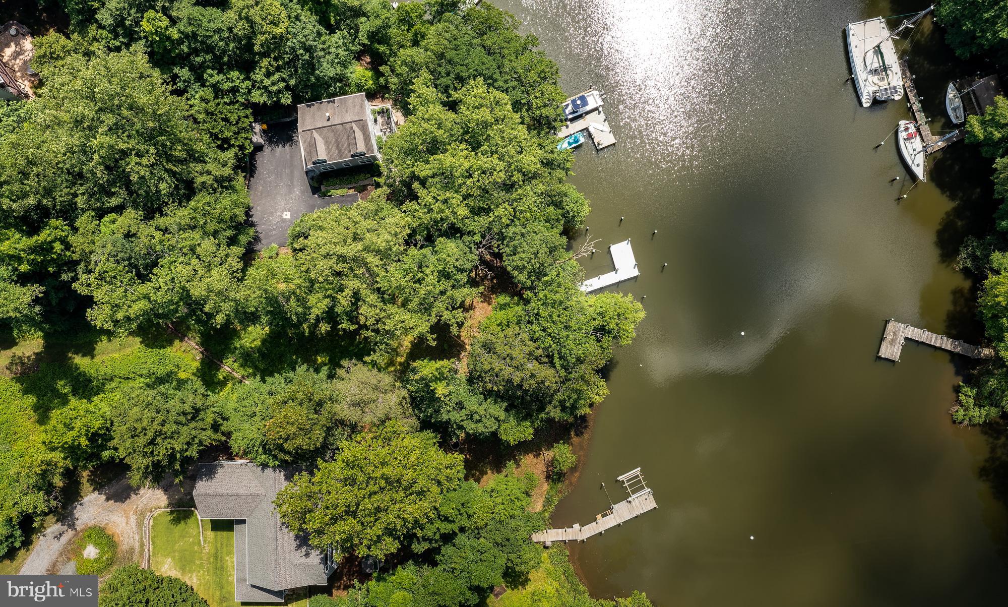 357 Forest Beach Road Annapolis, MD 21409 - Photo 43 of 91 an aerial view of a house with a yard