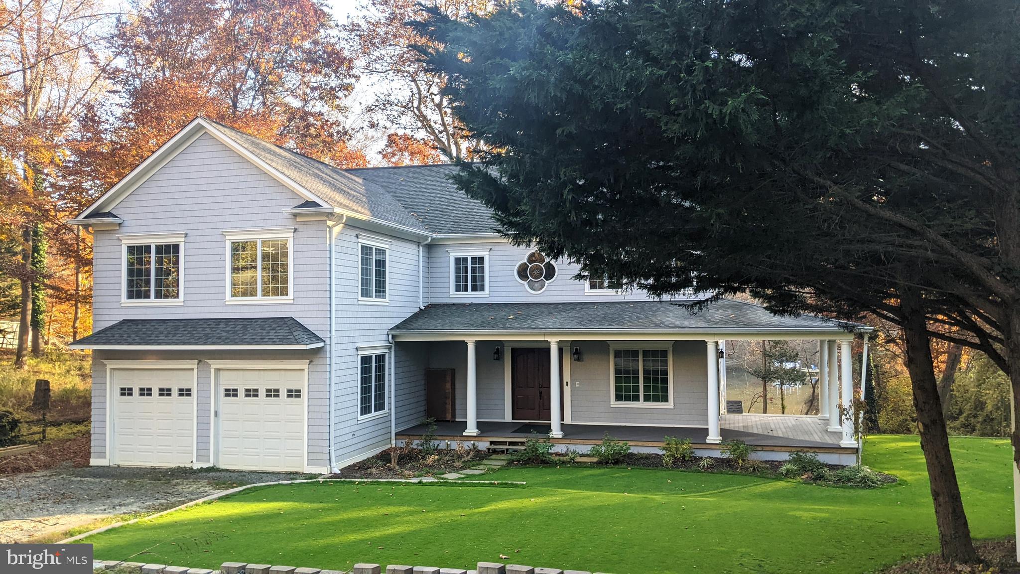 357 Forest Beach Road Annapolis, MD 21409 - Photo 67 of 91 a front view of a house with a yard
