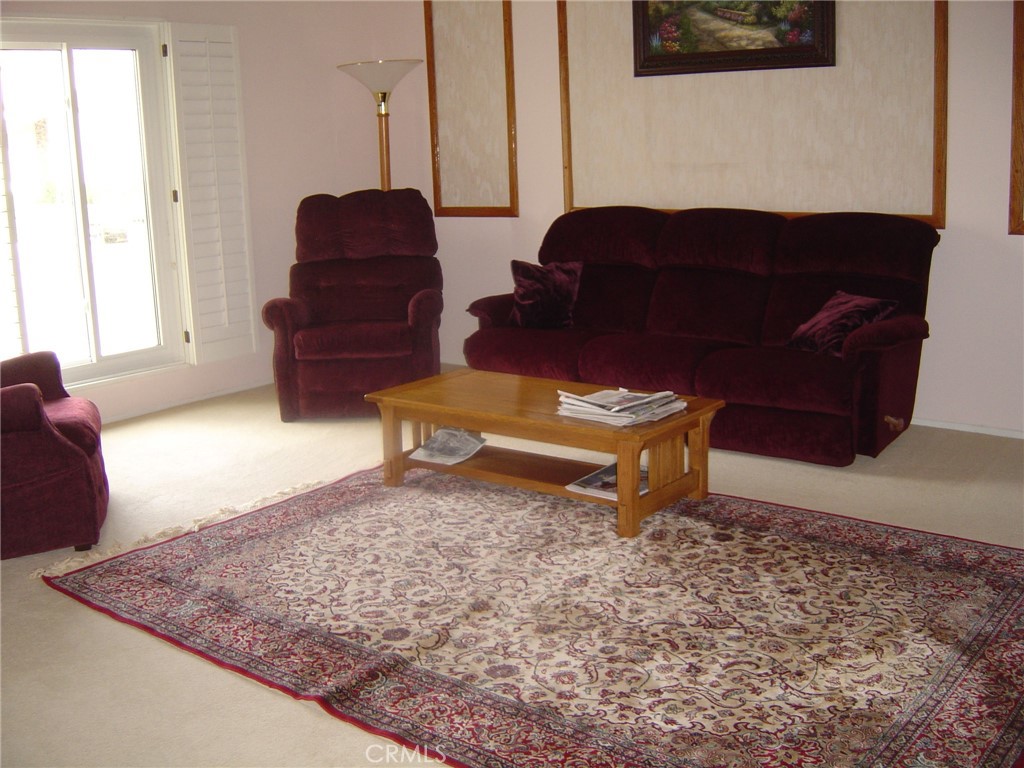 25 Mecklenberg Irvine, CA 92620 - Photo 4 of 12 a living room with furniture and a rug