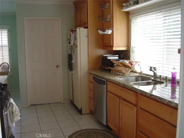 a bathroom with a sink a vanity and a mirror
