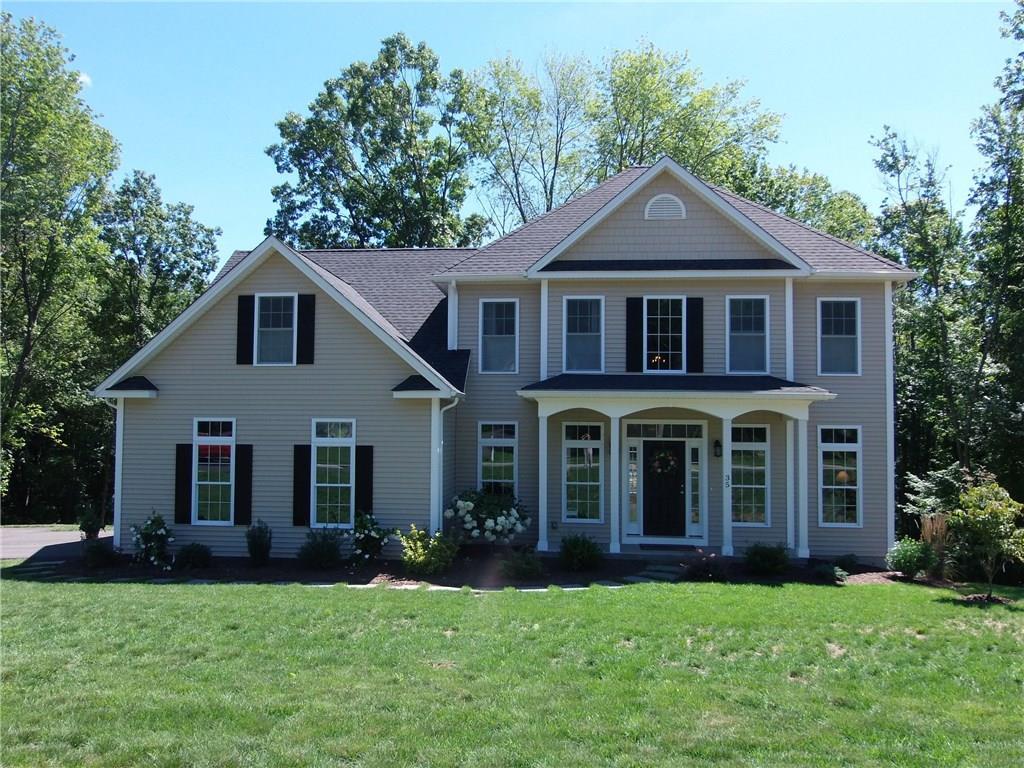 35 West Ridge Court Cheshire, CT 06410 - Photo 1 of 1 a front view of a house with a yard