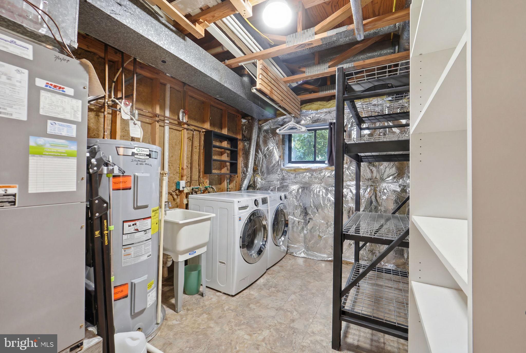 7660 Southern Oak Drive Springfield, VA 22153 - Photo 32 of 37 UTILITY ROOM W/WASHER/DRYER PLUS STORAGE