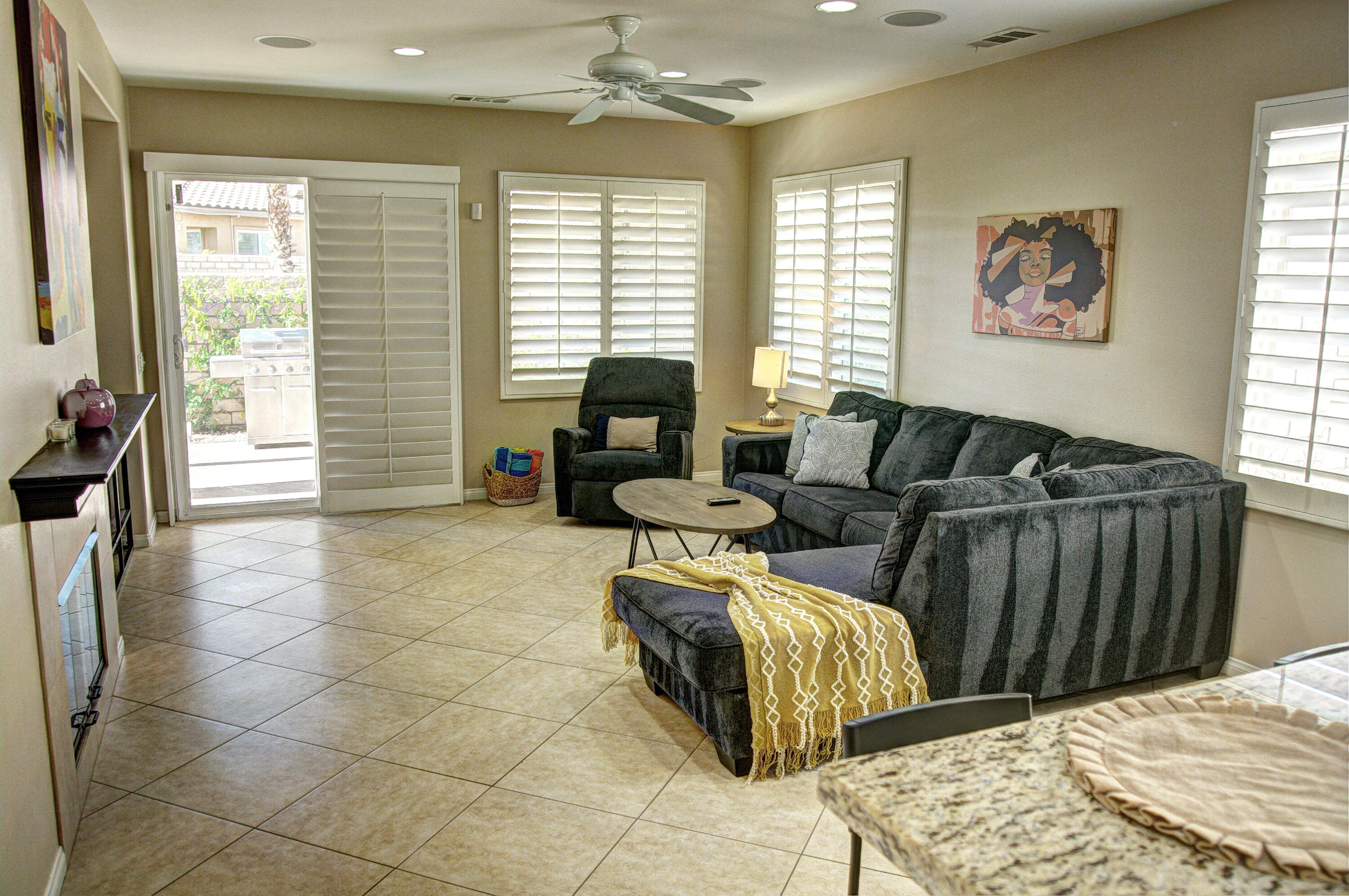 82053 Cochran Drive Indio, CA 92201 - Photo 15 of 38 a bedroom with furniture and a large window