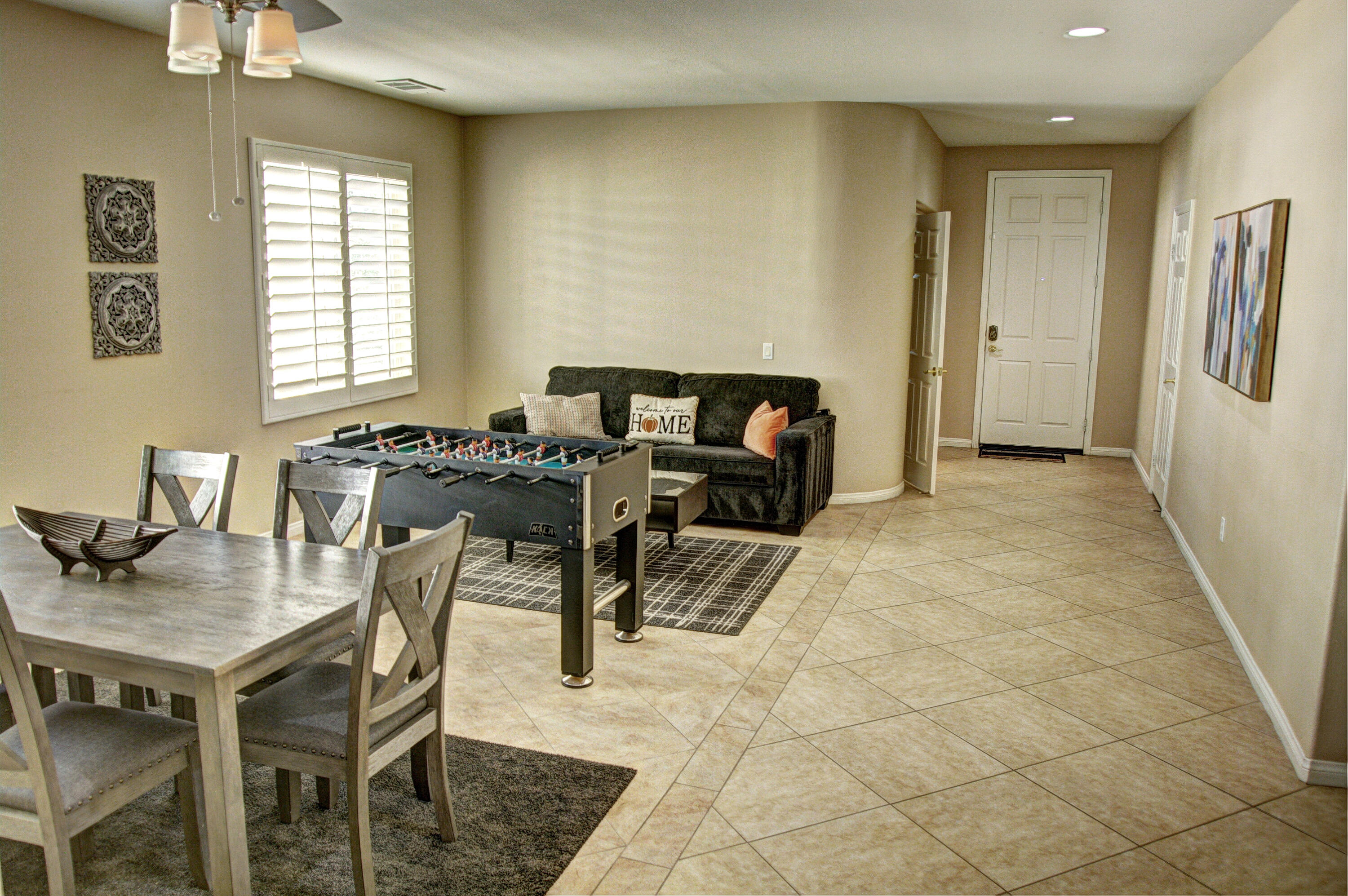 82053 Cochran Drive Indio, CA 92201 - Photo 2 of 38 a dining room with furniture and window