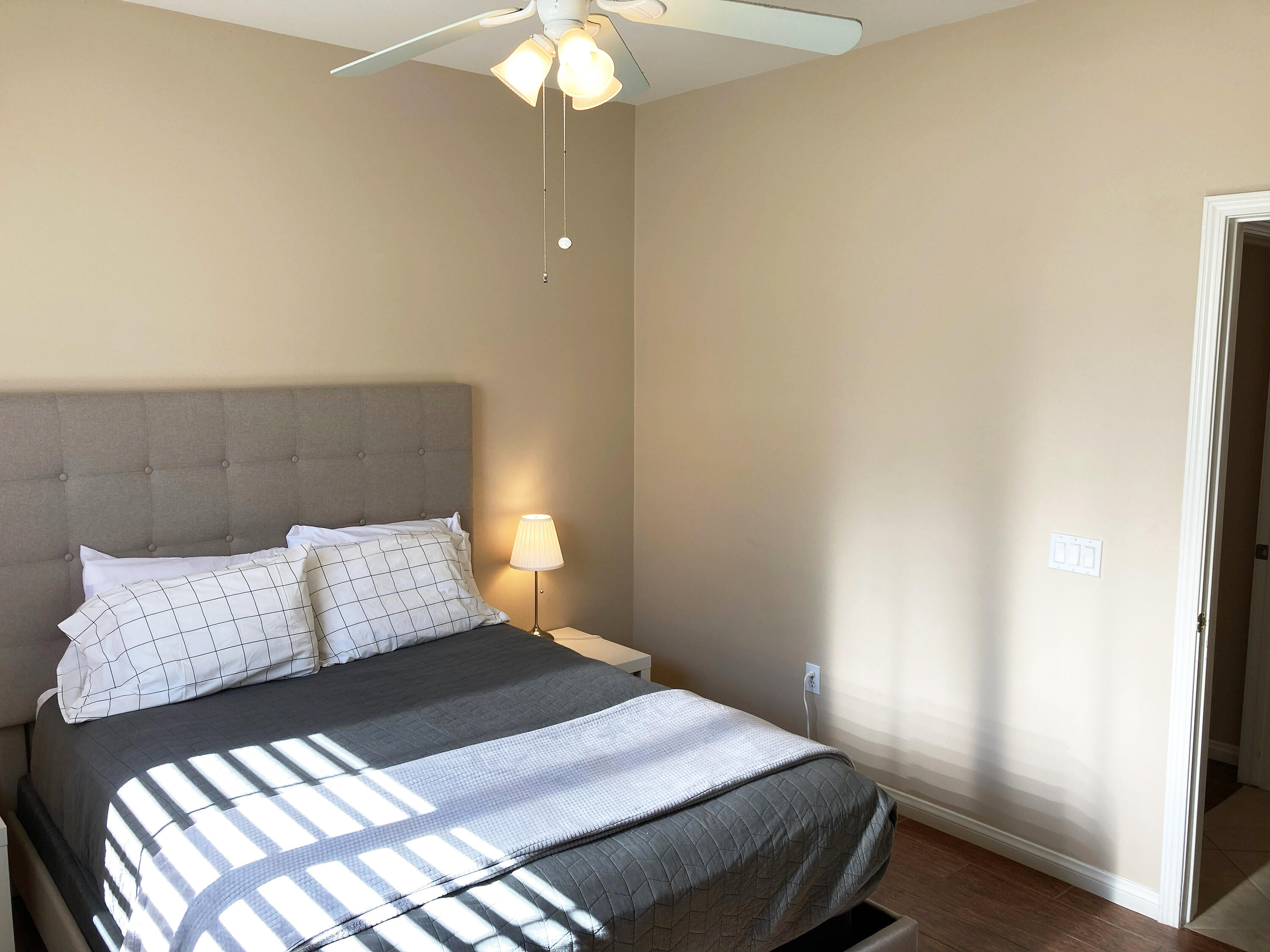 82053 Cochran Drive Indio, CA 92201 - Photo 21 of 38 a bedroom with a bed and a window