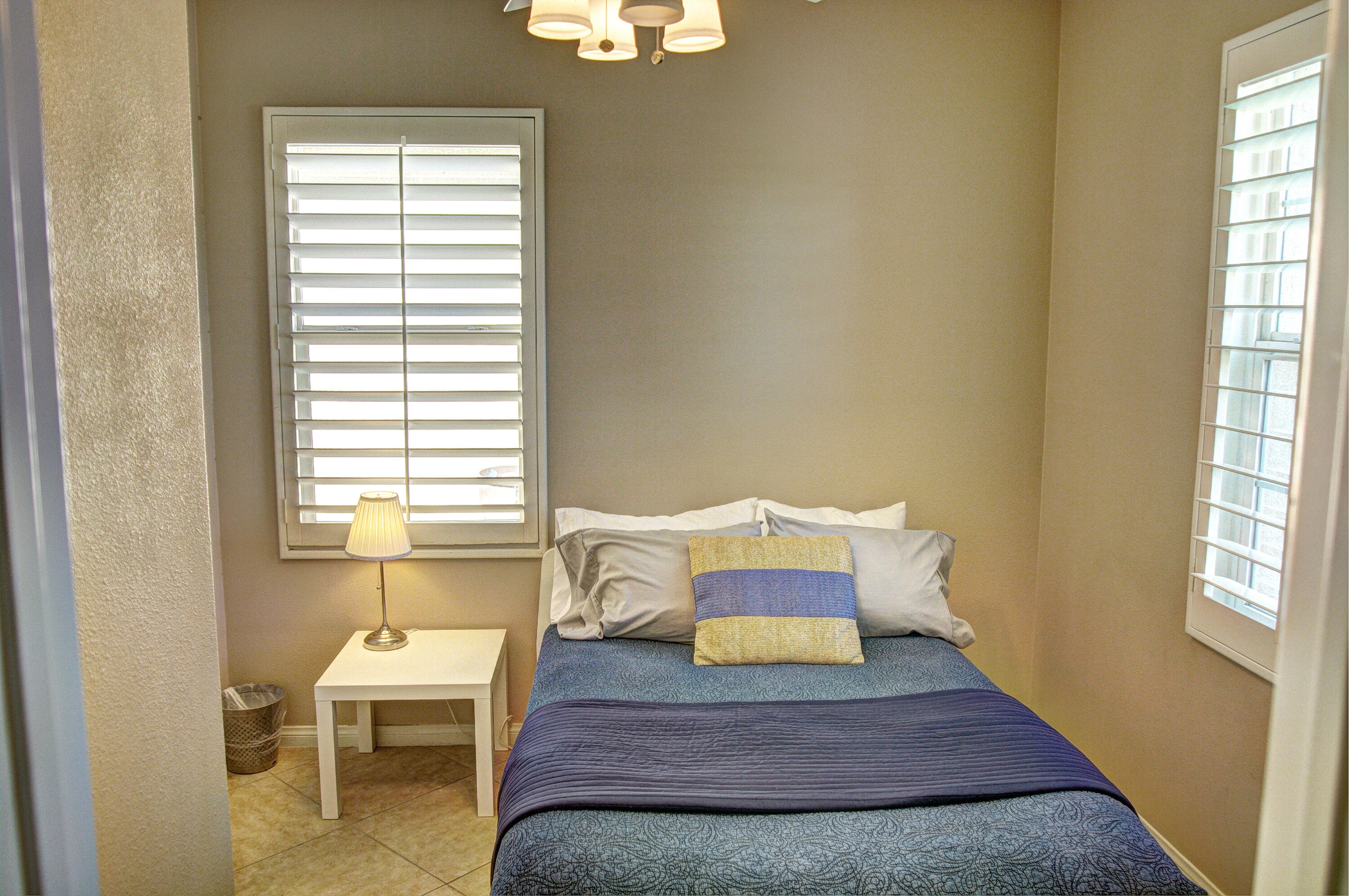 82053 Cochran Drive Indio, CA 92201 - Photo 27 of 38 a view of a bedroom with furniture and window